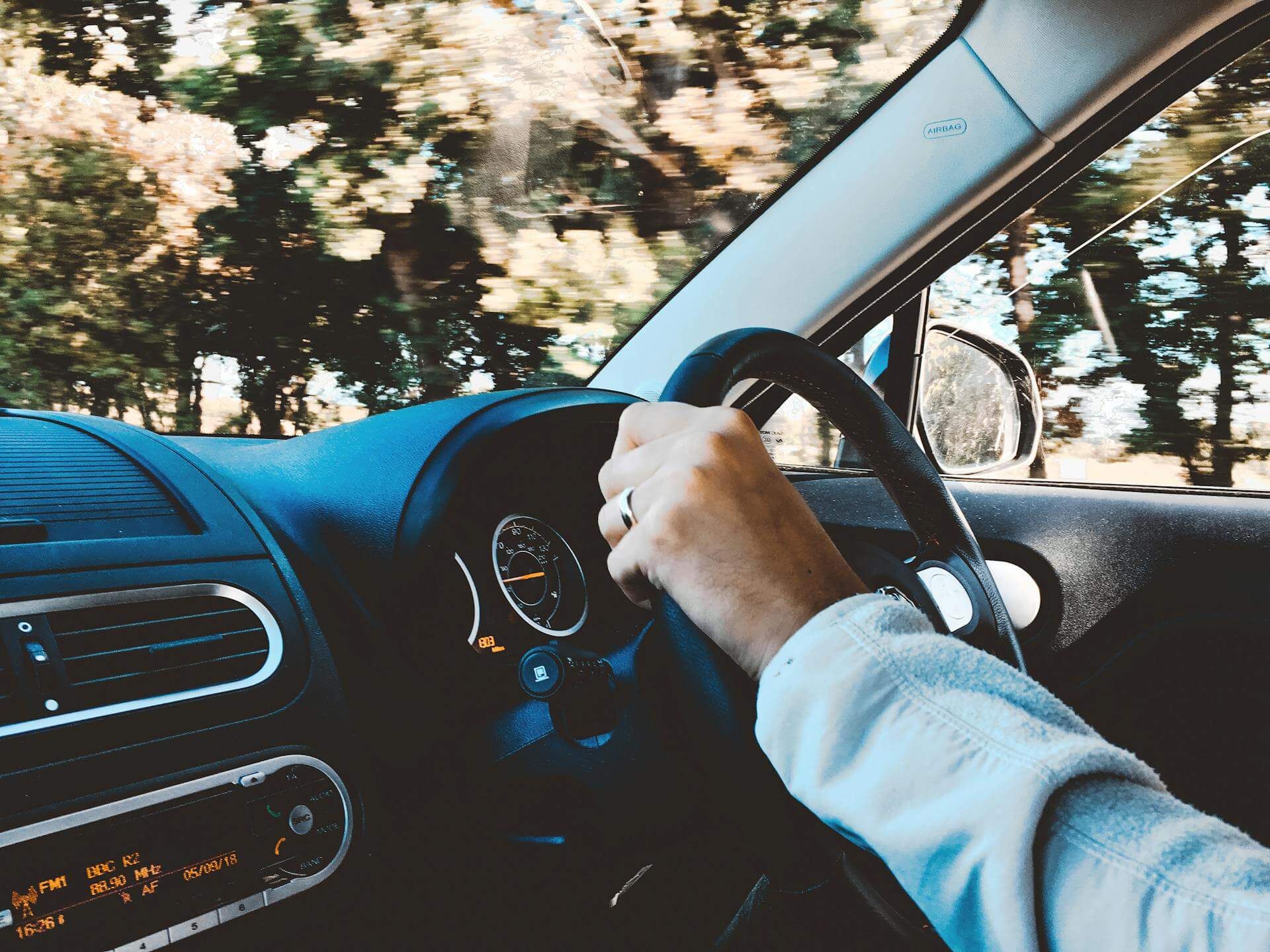 A man driving a car