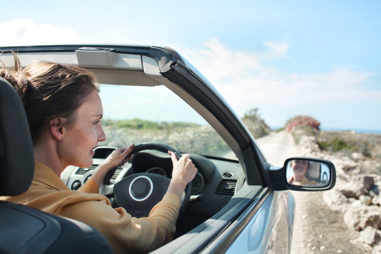 a girl behind the wheel